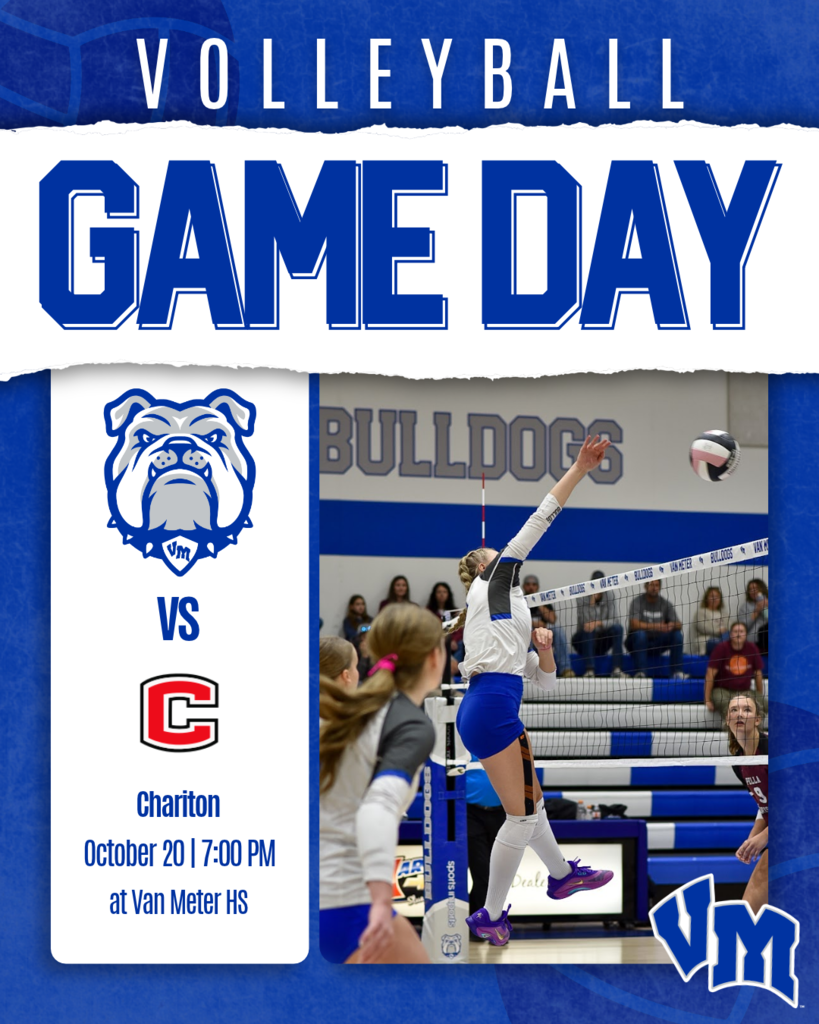 Female volleyball player jumping to spike the ball during a high school match at Van Meter HS gym with Bulldogs banner in background.