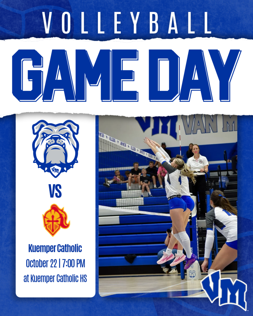 Female volleyball players in blue and white uniforms jumping to block a ball at a high school gym during a game day announcement.