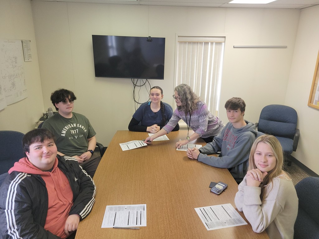 Students registering to vote with clerk