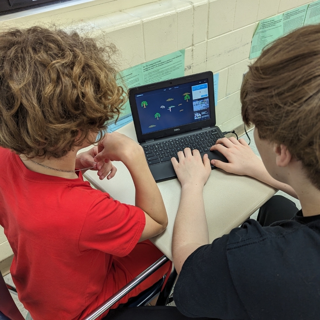 Students playing Oregon Trail 