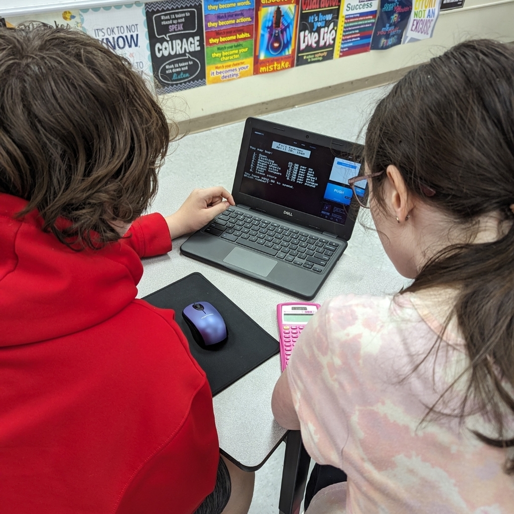 Students playing Oregon Trail 