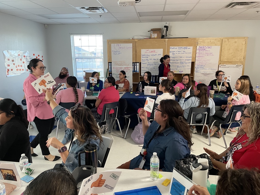 Teachers engaging in fact or fib.