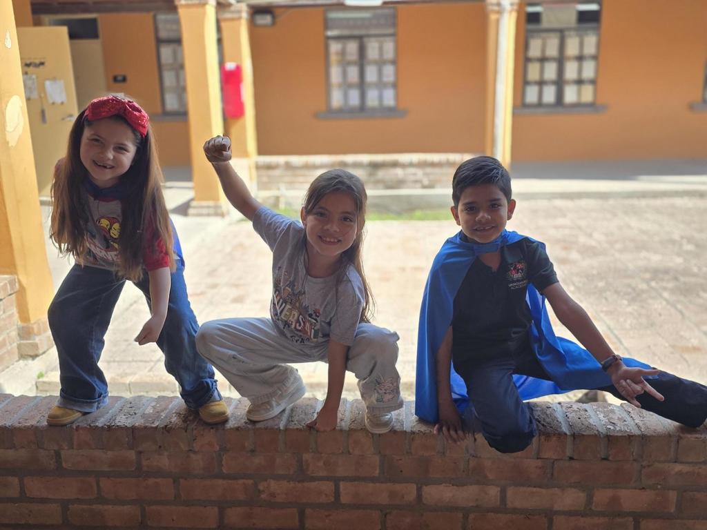 Students in superhero outfits