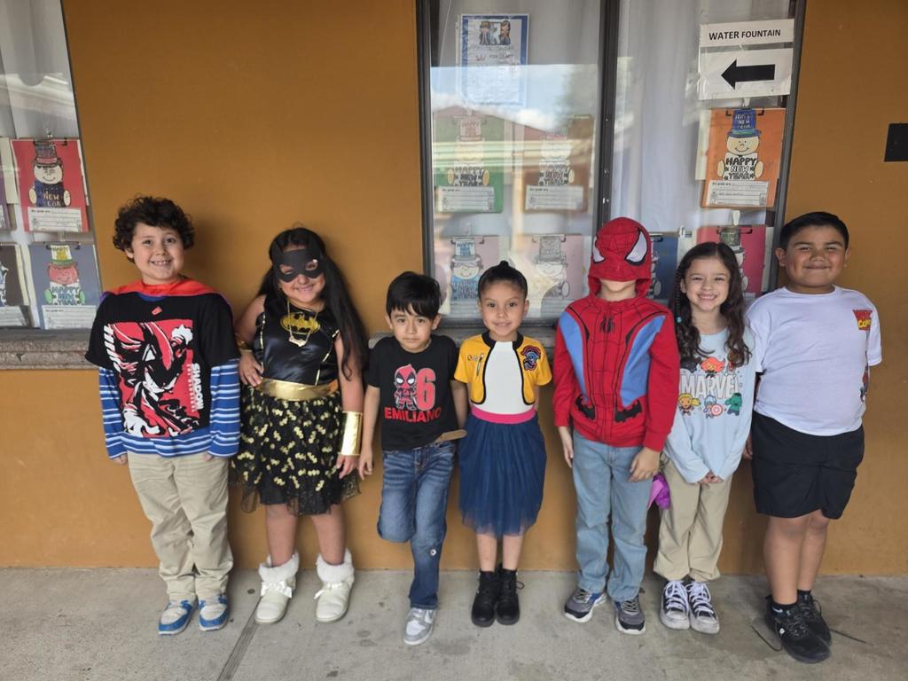 Students in superhero outfits