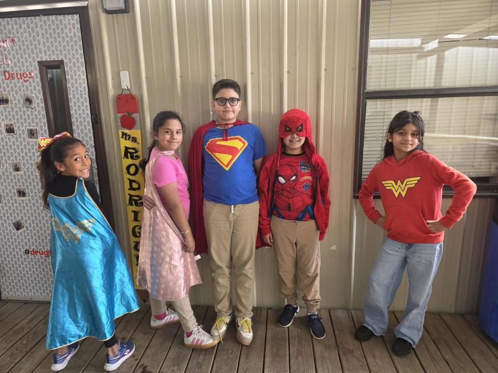 Students in superhero outfits
