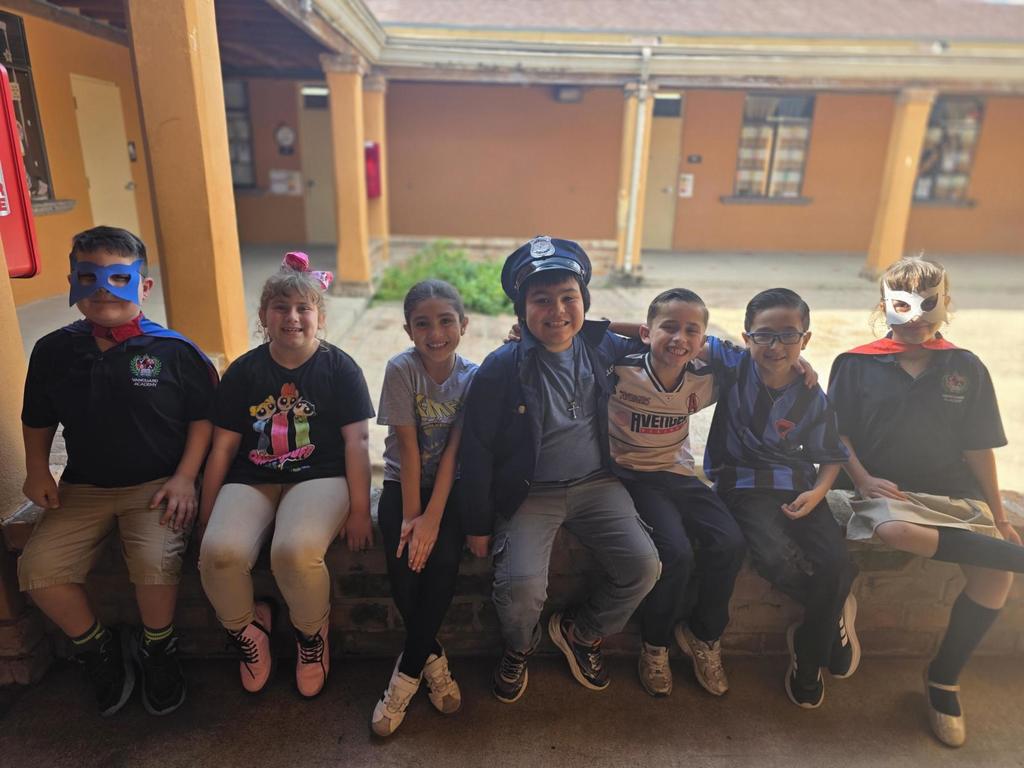 Students in superhero outfits