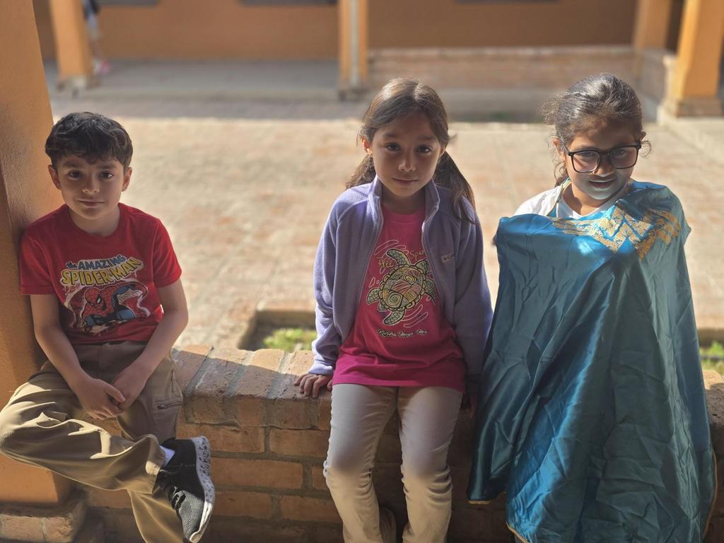 Students in superhero outfits