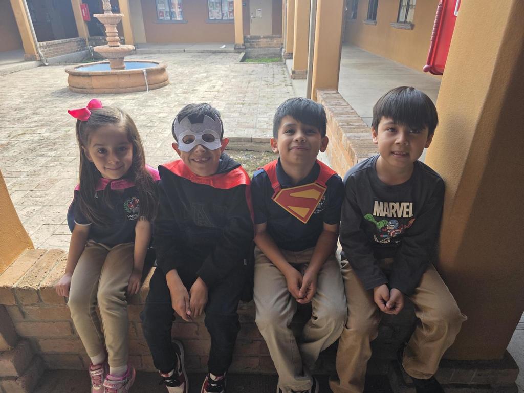 Students in superhero outfits