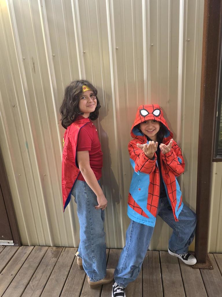 Students in superhero outfits