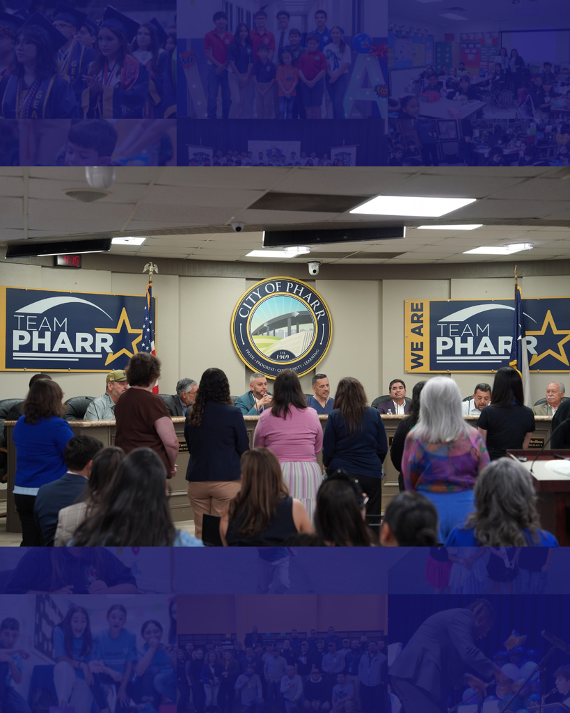 A group of people in a room with banners for Team Pharr. Some sit and others stand, facing forward.