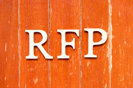 Orange blackground, white writing that says RFP