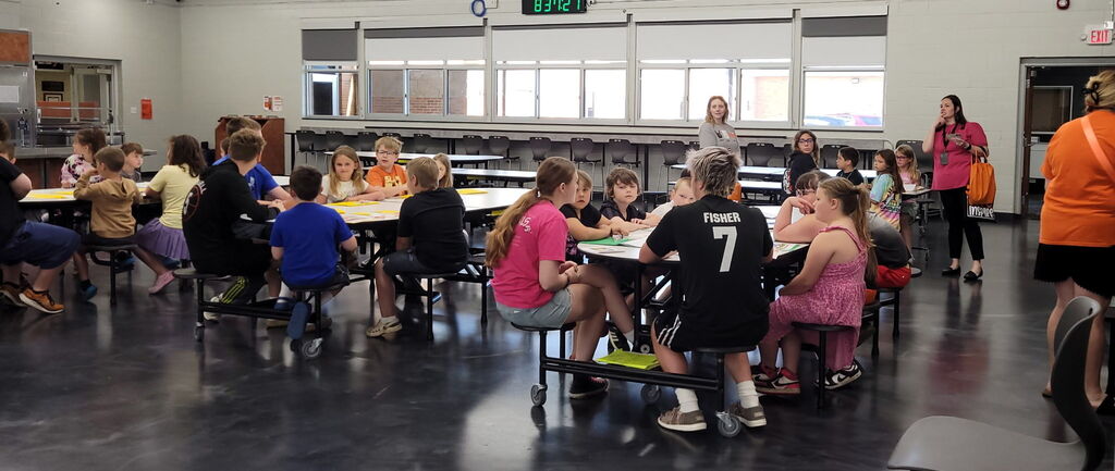 Freshmen and their reading buddies from 2nd and 3rd grades