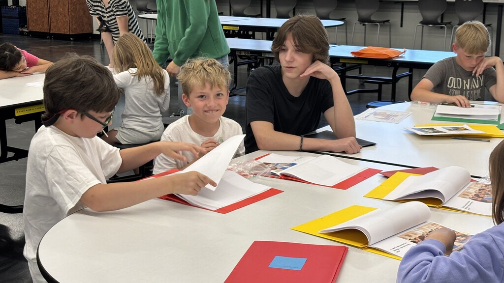 Freshmen and their reading buddies from 2nd and 3rd grades