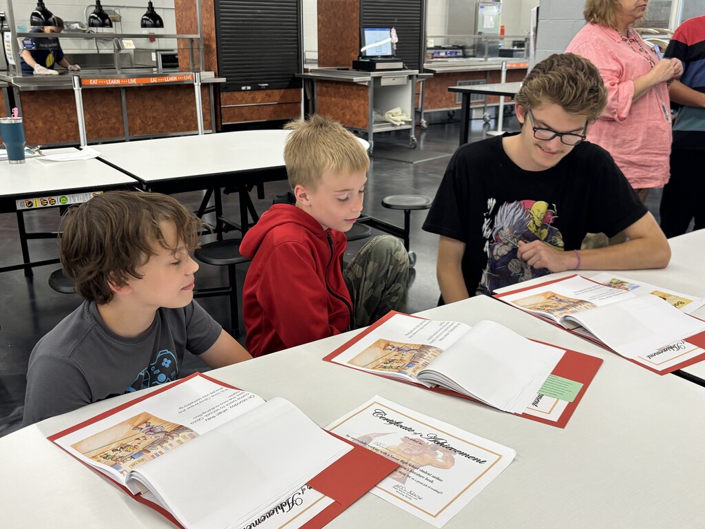 Freshmen and their reading buddies from 2nd and 3rd grades