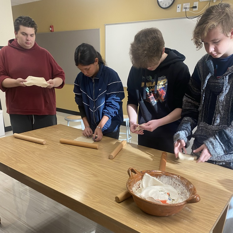 Spanish classes making Buñuelos