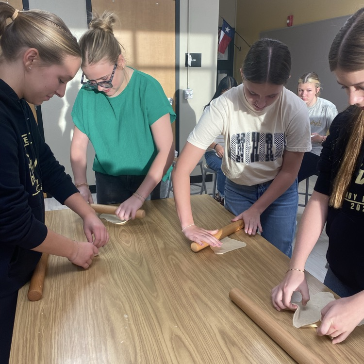 Spanish classes making Buñuelos