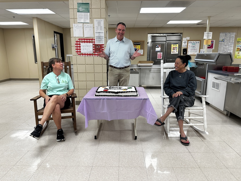 Retirees with their new rocking chairs