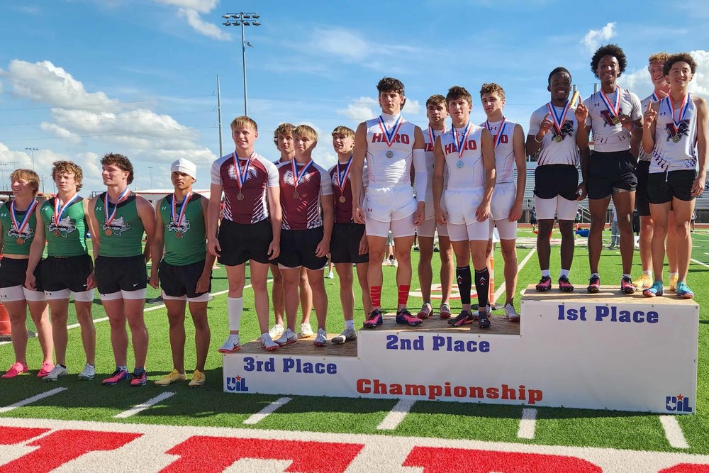 boys sprint relay medal stand