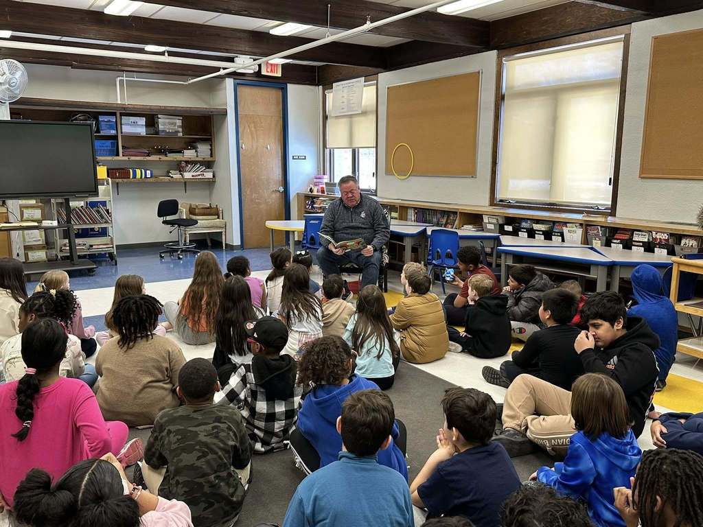 Visitors from the community reading for Read Across America Week