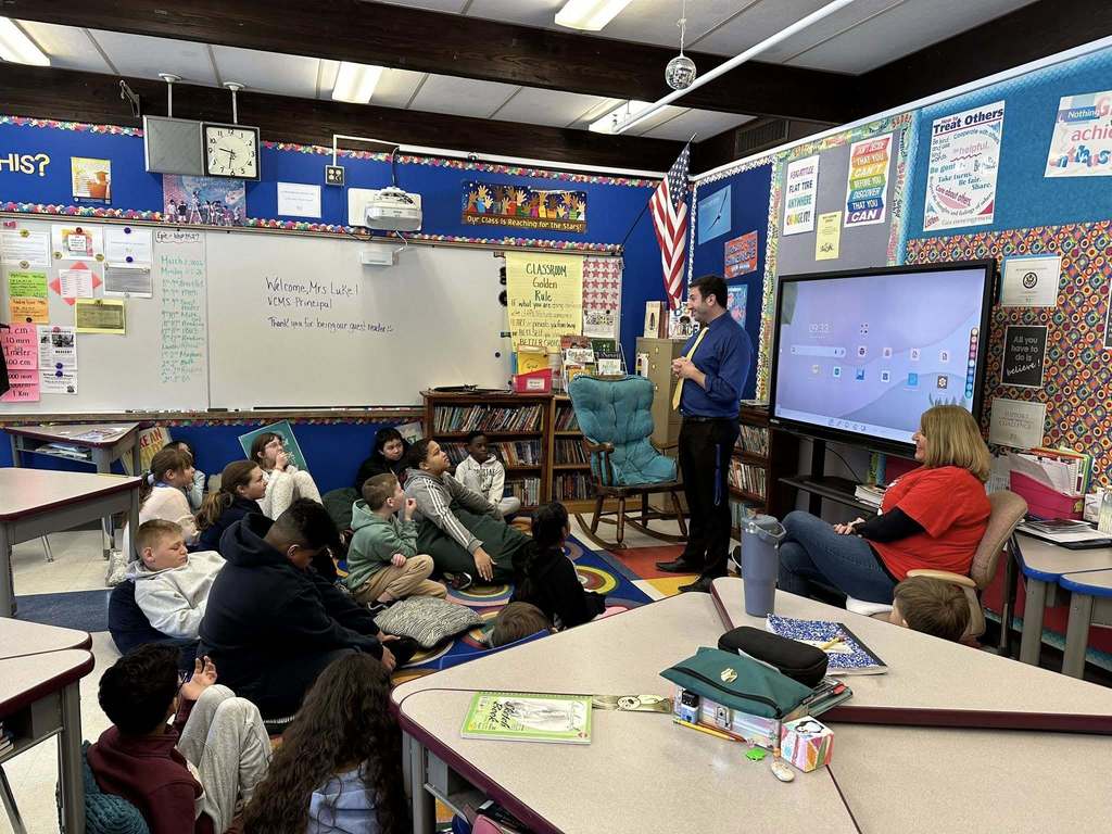Visitors from the community reading for Read Across America Week
