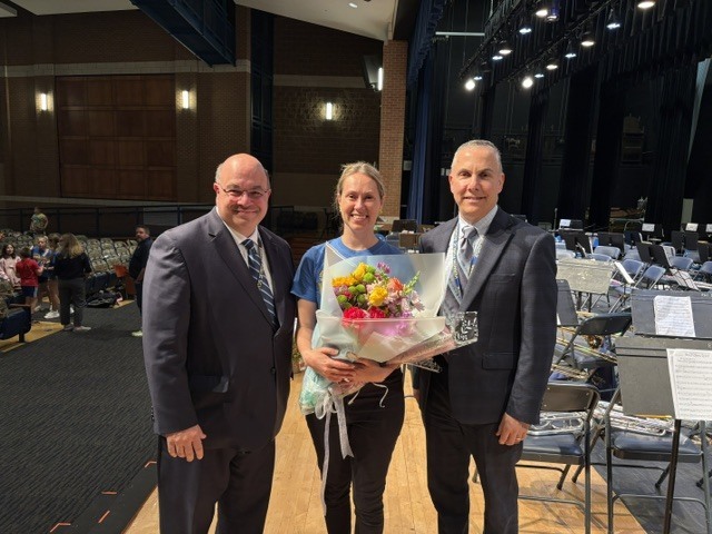 Mrs. Stein with the superintendent and assistant superintendent 