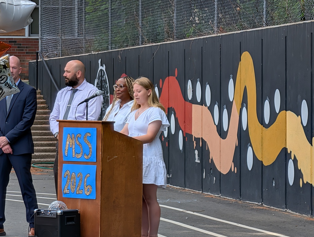 Katie Wheeler giving a speech at 5th grade graduation