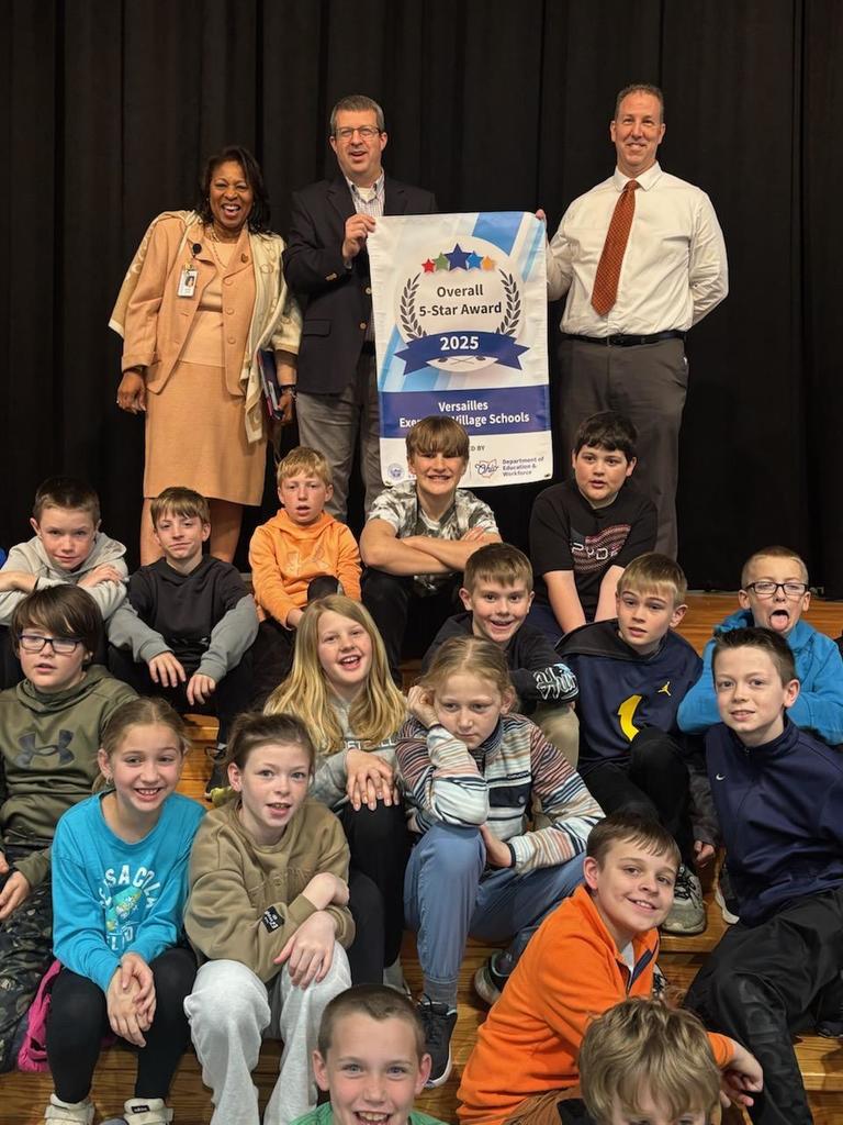 Dr. Claire Jones, Board Member Shaun Brewer, Superintendent Harmon and several 4th grade students
