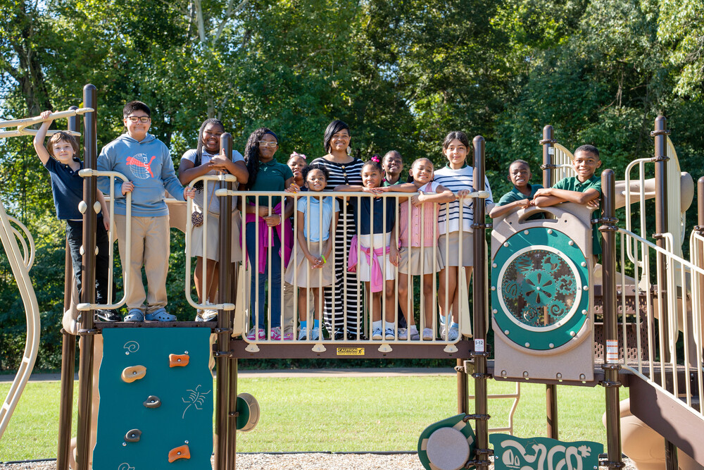 Students smiling on playground