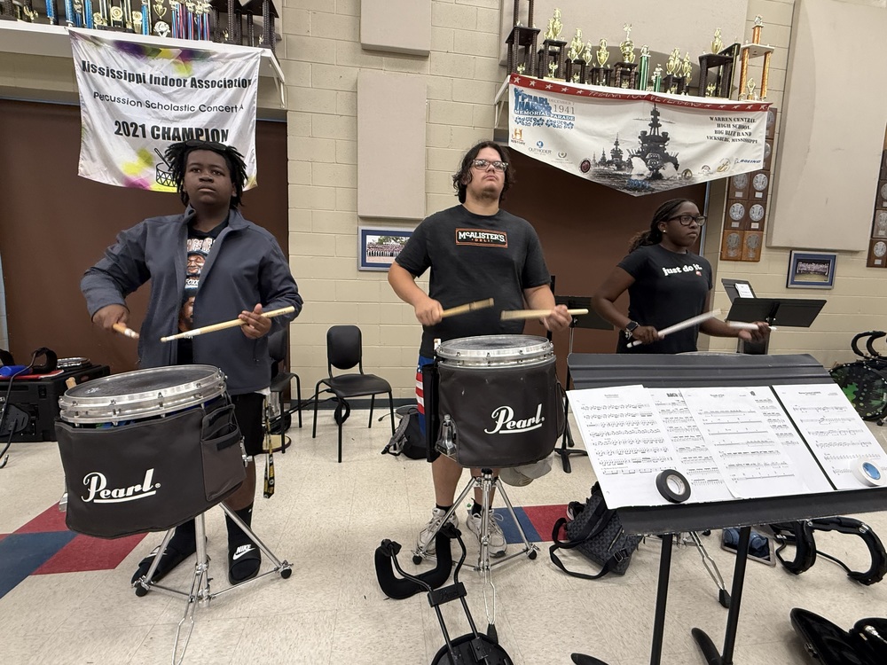 Students preparign music for marching season