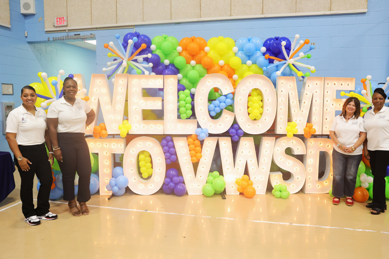 hr staff with welcome sign