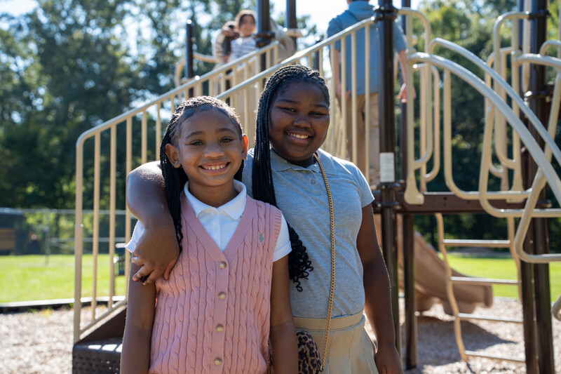 Children smiling on playground