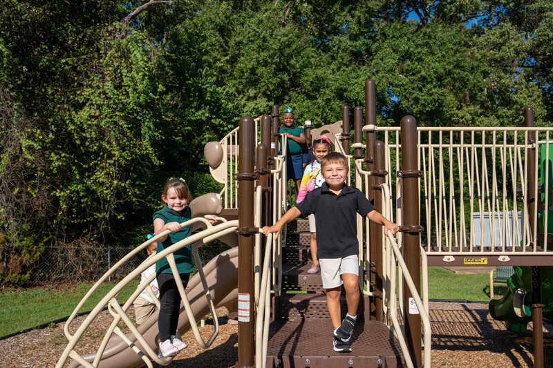 Children smiling on playground
