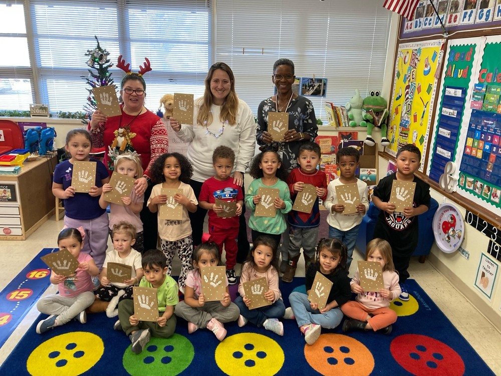 Students with cards in classroom