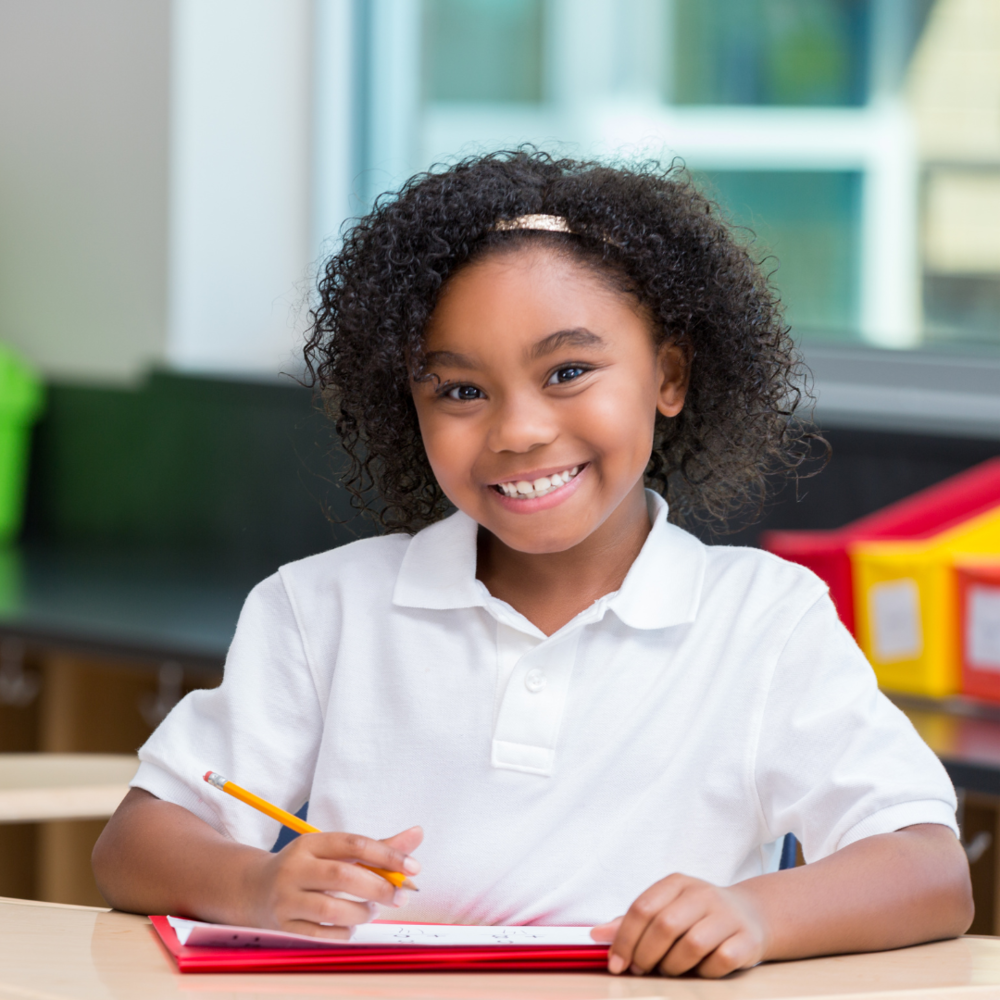 student taking test smiling