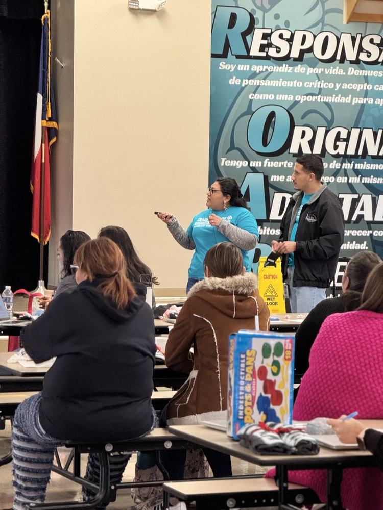 people sitting at desks at meeting