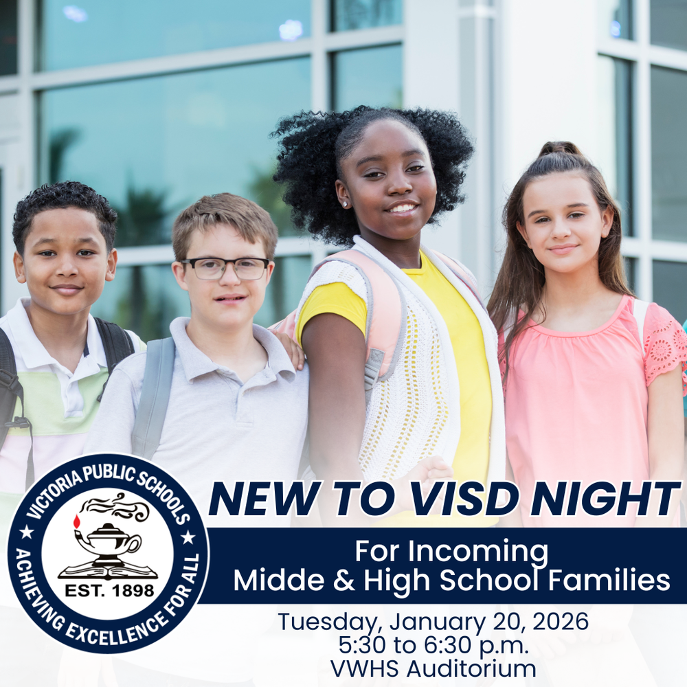 4 students standing together smiling