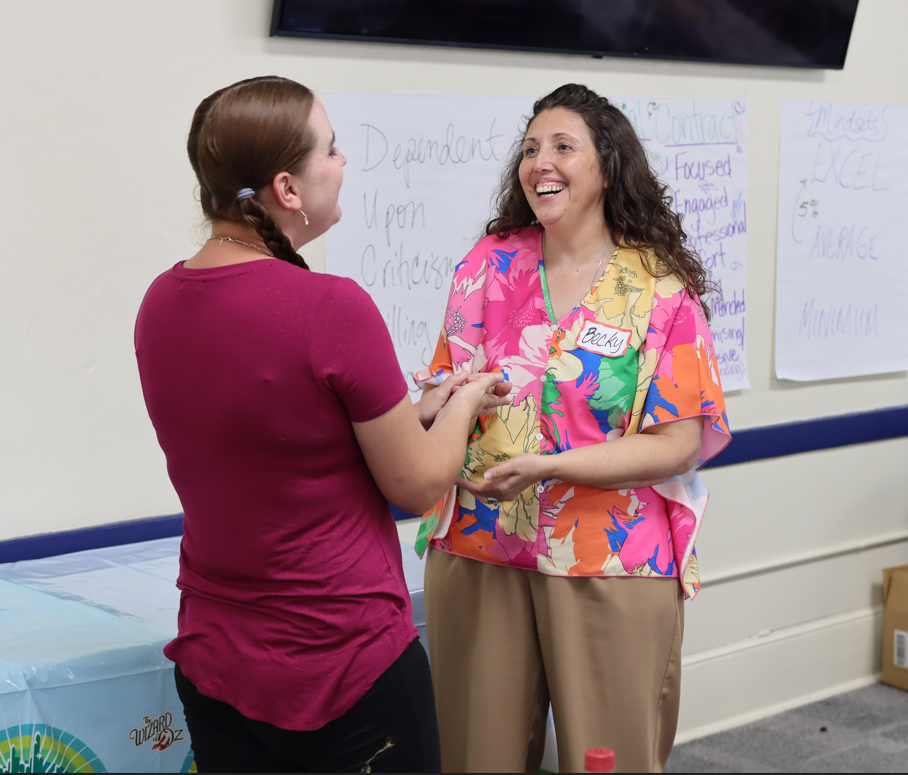 Two Bridge Teachers engaging with each other
