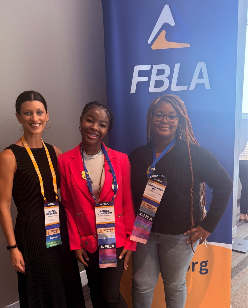 8th grade students travel to FBLA nationals with advisor