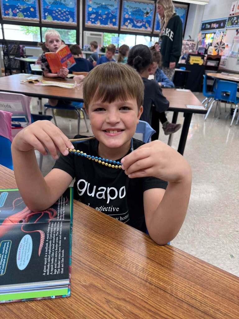 Student with beads