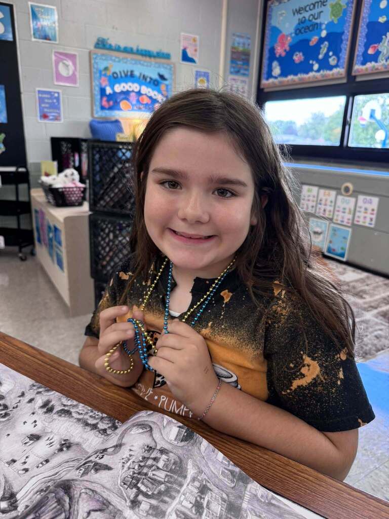Student with beads