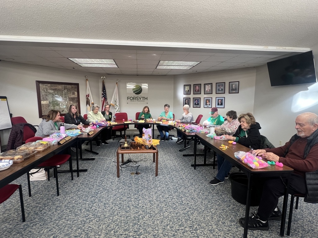 Volunteers Filling Easter Eggs
