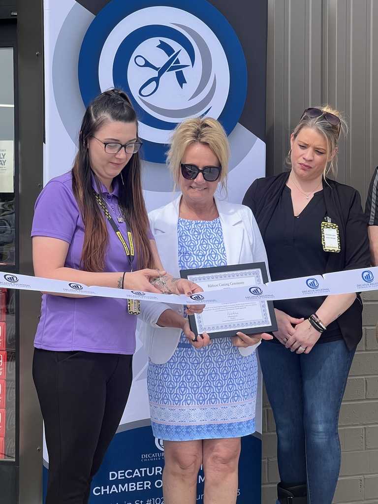 Close up of ribbon cutting