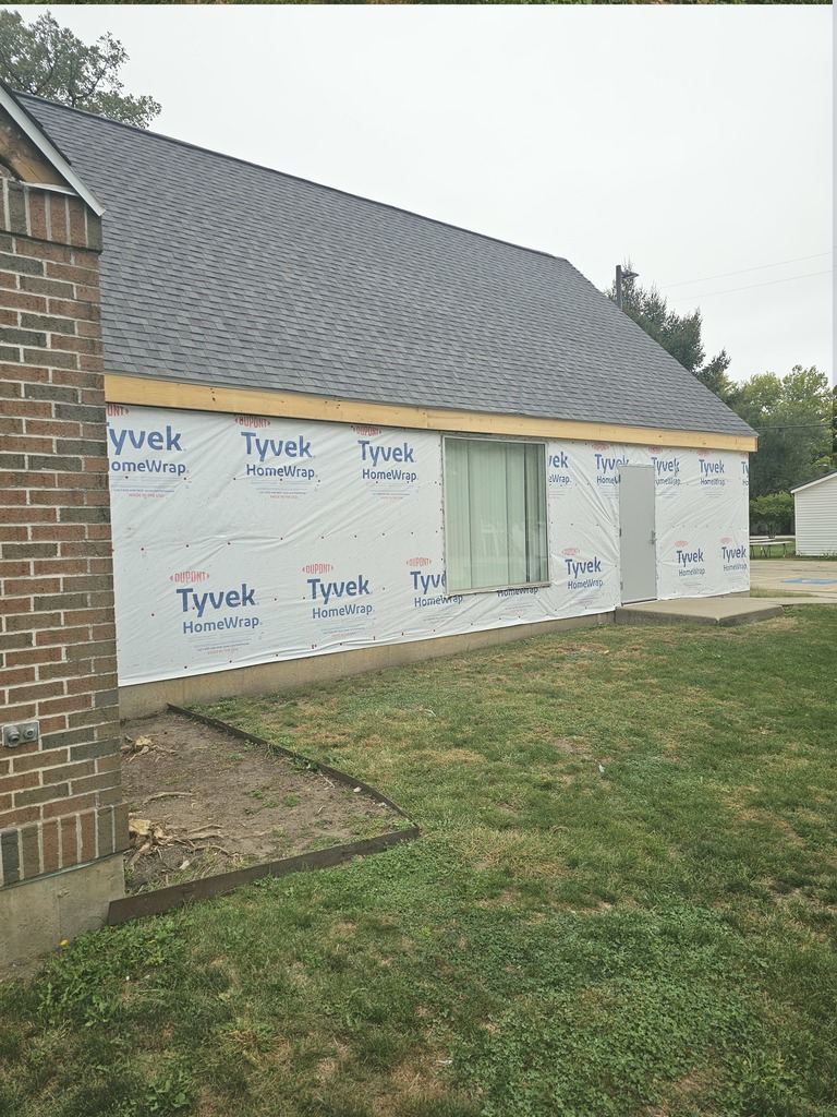 Photograph of exterior remodeling work on library building