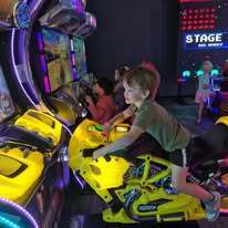 Student playing motorcycle game