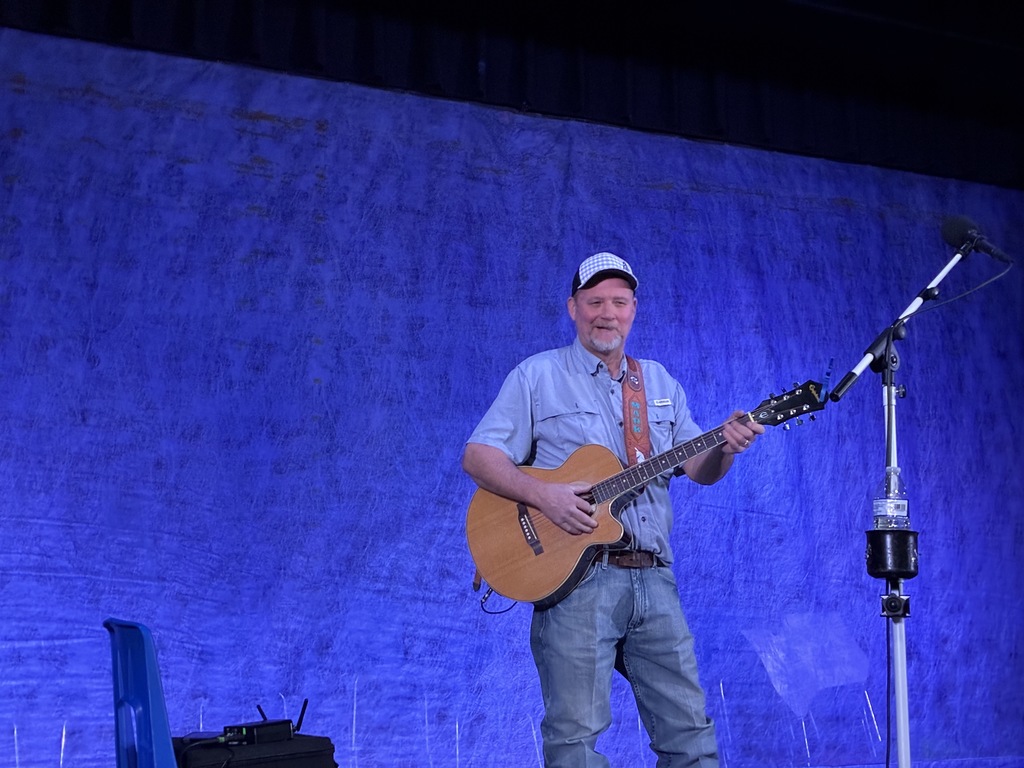 Our own, Mark Chamberlain, played music to welcome teachers