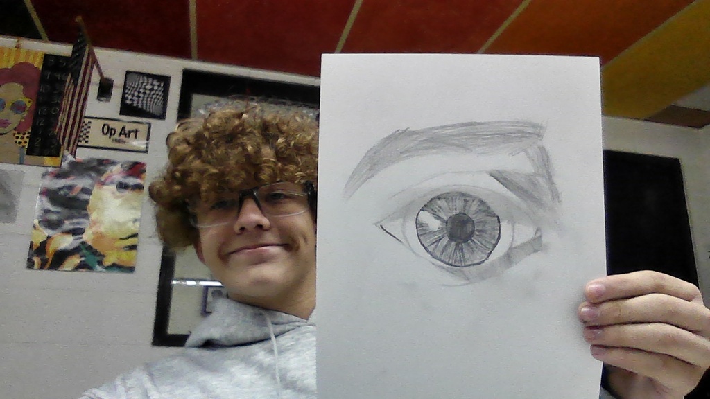 Art club is learning to draw face parts and then faces:)