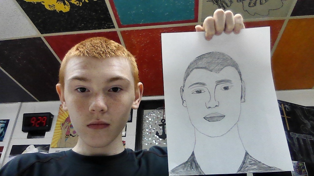 Art club is learning to draw face parts and then faces:)
