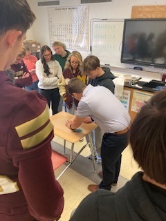 Alum visits Mr. Glover's Science Class