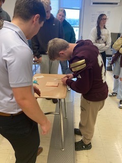 Alum visits Mr. Glover's Science Class