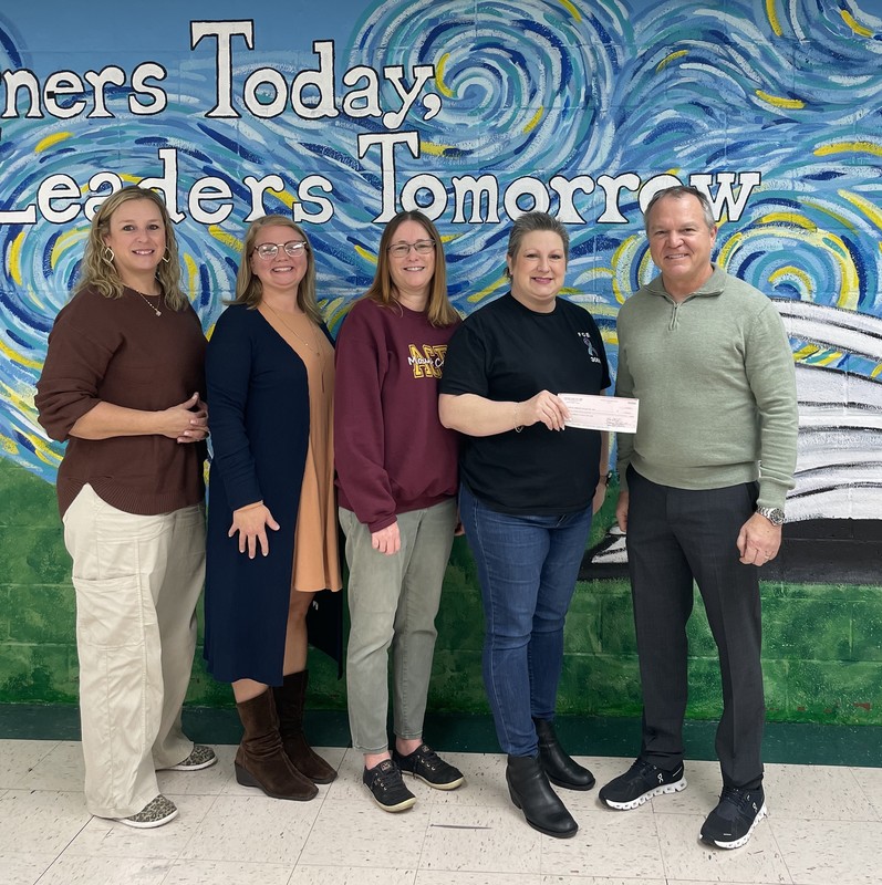 Julie Dickerson of Mt. Carmel Grade School, Laura Taylor of Mt. Carmel Elementary School, Amy Powers of Mt. Carmel High School, Jennifer Betsch of the Eagles and Dr. Chuck Bleyer.